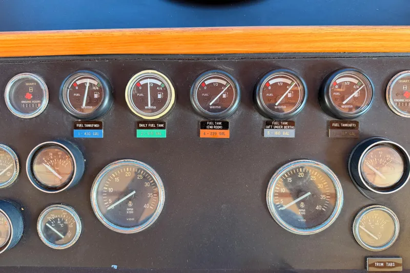 Slide: The Image of Control panel of a 1984 Hartman-Palmer 60 Flush Deck Motor Yacht with fuel and engine gauges. - 52
