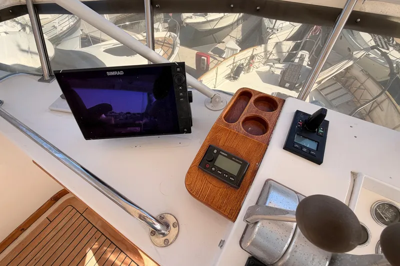 Slide: The Image of Control panel of 1984 Hartman-Palmer 60 Flush Deck Motor Yacht with navigation equipment. - 66