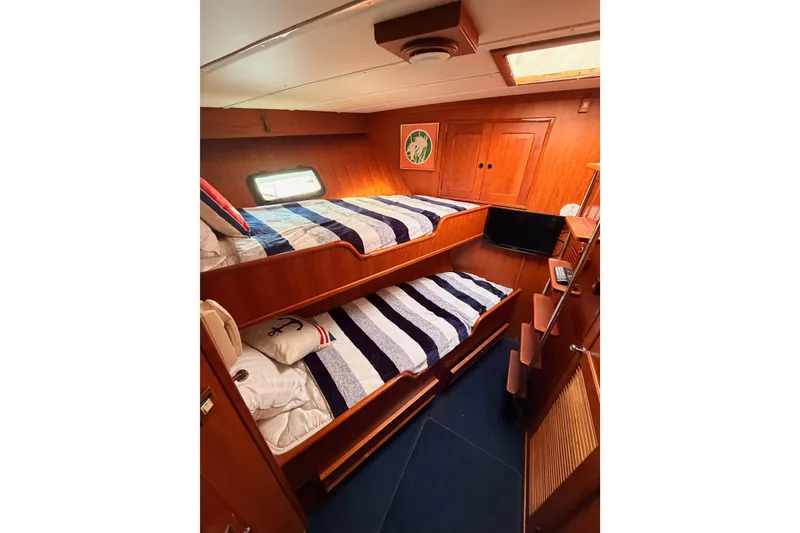 Slide: The Image of Interior of 1984 Hartman-Palmer 60 Flush Deck Motor Yacht with twin bunk beds. - 82