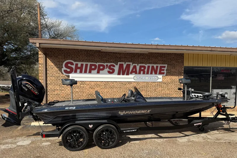 Slide: The Image of 2026 Phoenix 921 Elite X boat at Shipp's Marine dealership. - 1
