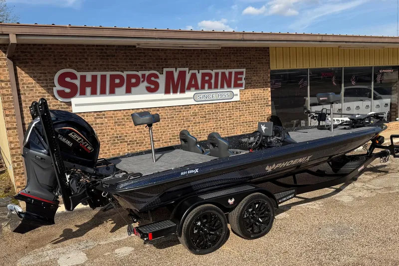 Slide: The Image of 2026 Phoenix 921 Elite X boat at Shipp's Marine dealership. - 11