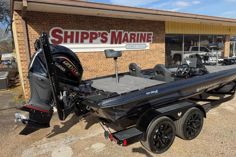 Slide: The Image of 2026 Phoenix 921 Elite X boat at Shipp's Marine dealership, featuring Yamaha engine. - 2