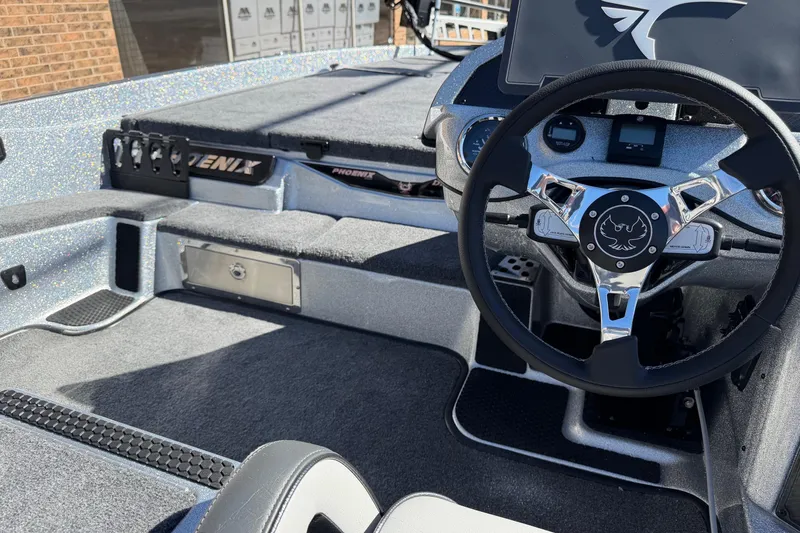 Slide: The Image of Interior of Phoenix 921 Elite X boat, model year 2026. - 9