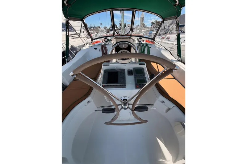 Slide: The Image of Cockpit of 2005 Beneteau Oceanis Clipper 423 sailboat with steering wheel and navigation instruments. - 14