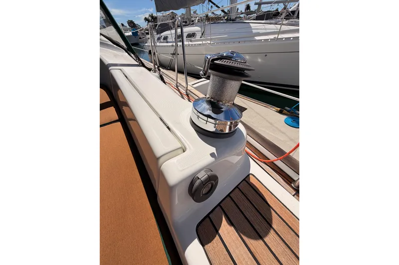 Slide: The Image of Deck view of 2005 Beneteau Oceanis Clipper 423 sailboat with winch and teak flooring. - 16