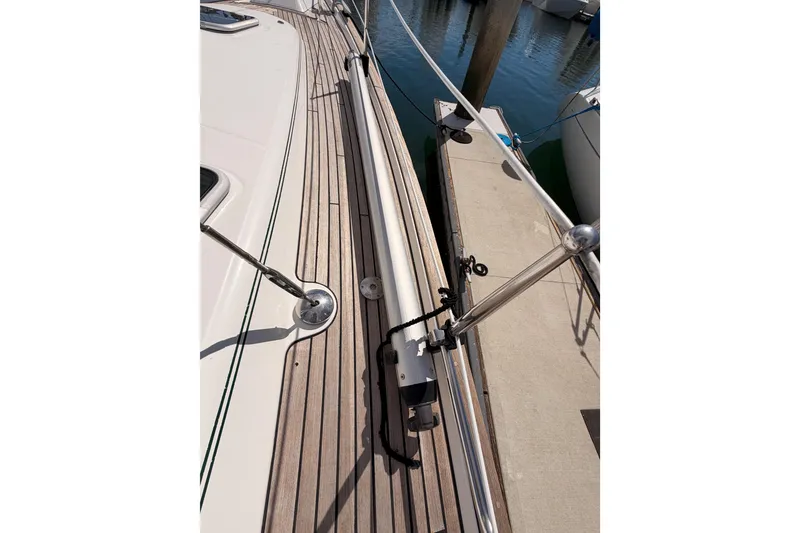 Slide: The Image of 2005 Beneteau Oceanis Clipper 423 yacht deck with wooden finish at marina. - 21