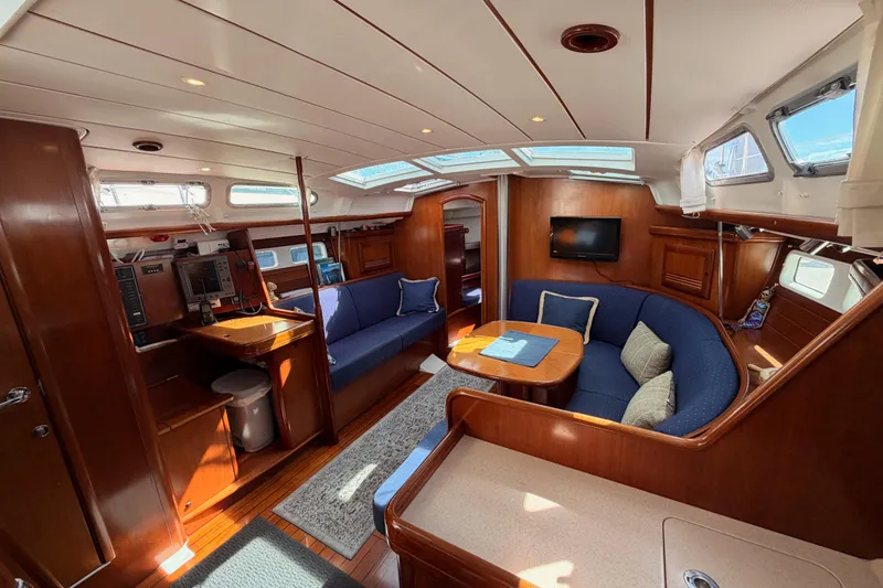 Slide: The Image of Luxurious interior of 2005 Beneteau Oceanis Clipper 423 yacht with elegant wood finish. - 44