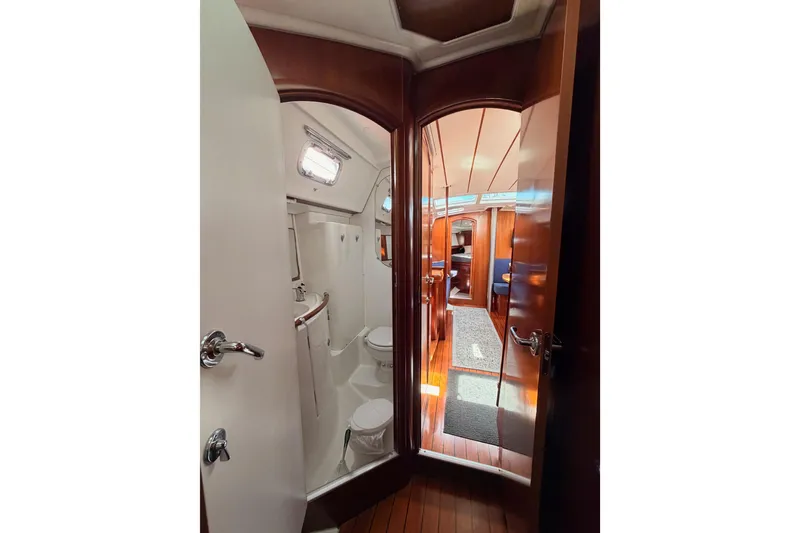 Slide: The Image of Interior view of 2005 Beneteau Oceanis Clipper 423 yacht, featuring bathroom and cabin. - 51