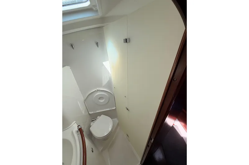 Slide: The Image of Bathroom interior of 2005 Beneteau Oceanis Clipper 423 yacht, featuring compact design. - 64