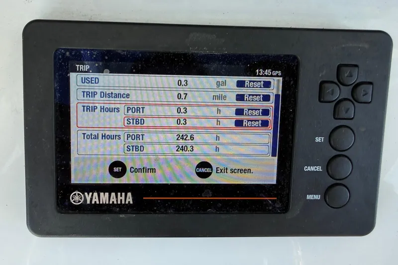 Slide: The Image of Yamaha GPS display on 2020 Sea Hunt Gamefish 27 showing trip and total hours. - 10