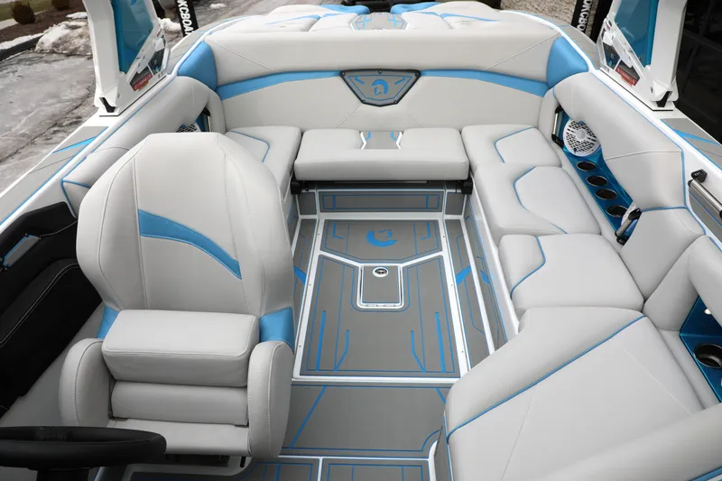 Slide: The Image of Luxurious interior of 2026 Centurion Nv233 boat with modern seating and sleek design. - 16