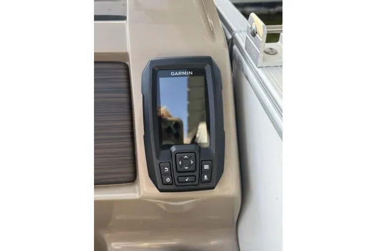 Slide: The Image of Garmin device on 2021 Bennington L 24 Swingback boat dashboard. - 8