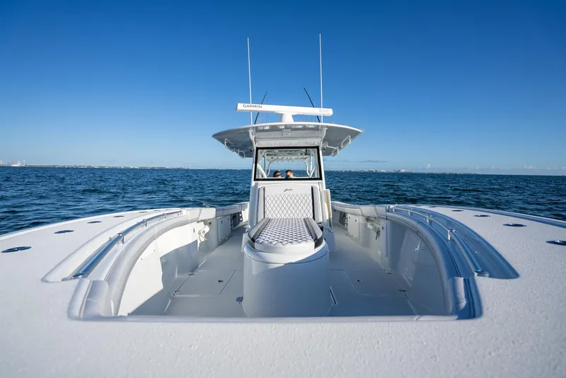 Slide: The Image of 2019 Yellowfin 39 boat on open water, clear blue sky. - 27