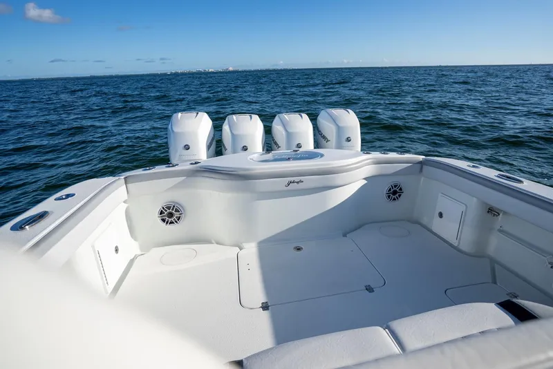 Slide: The Image of 2019 Yellowfin 39 boat with quad engines on open water. - 33