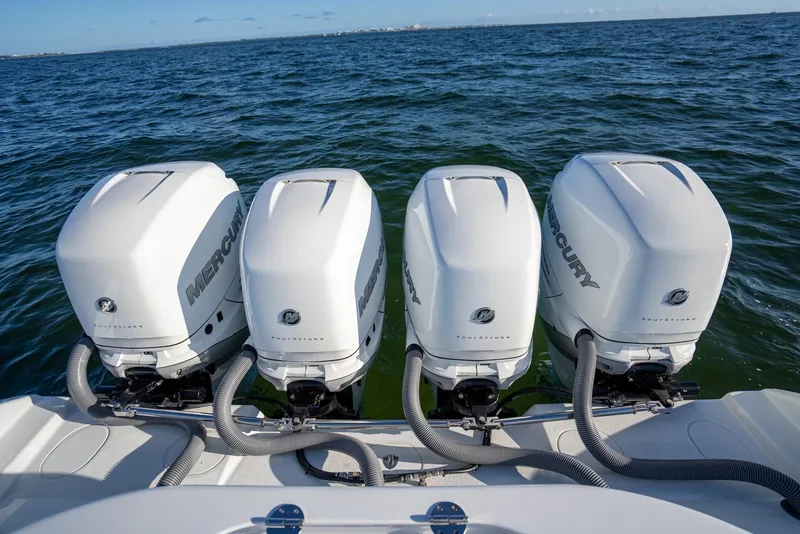 Slide: The Image of 2019 Yellowfin 39 boat with four Mercury outboard engines on the water. - 34