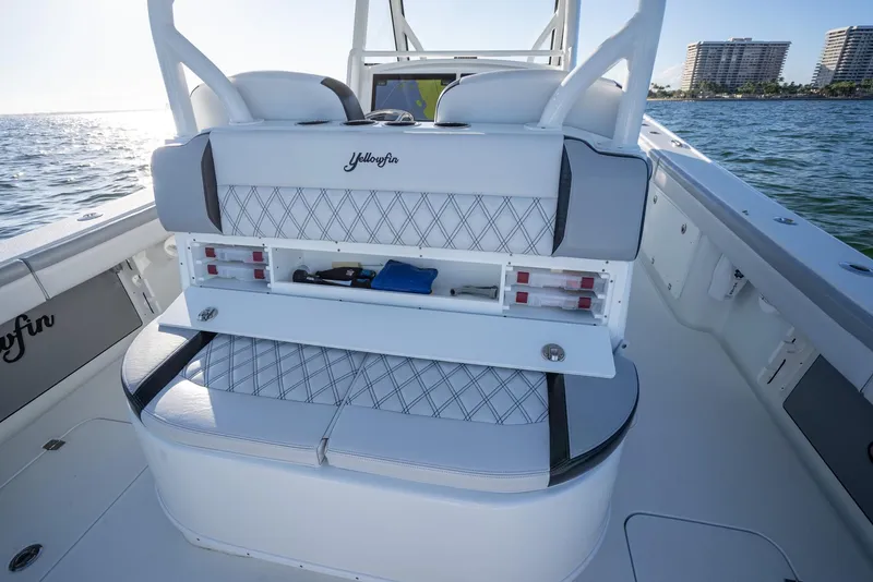 Slide: The Image of 2019 Yellowfin 39 boat interior with storage compartments and seating. - 36