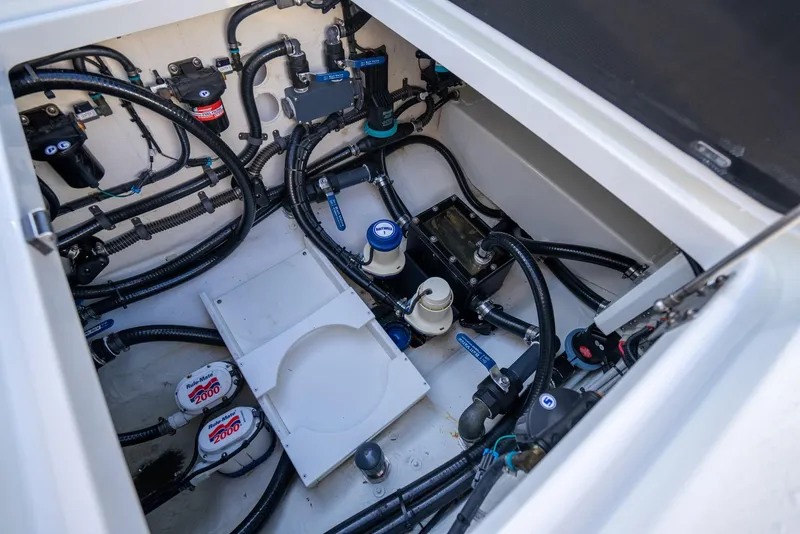Slide: The Image of 2019 Yellowfin 39 boat engine compartment with wiring and components. - 44