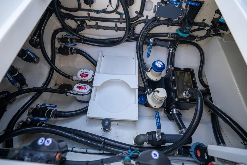 Slide: The Image of 2019 Yellowfin 39 boat engine compartment with wiring and components. - 45