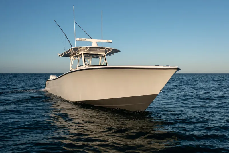 Slide: The Image of 2019 Yellowfin 39 boat cruising on open water. - 6