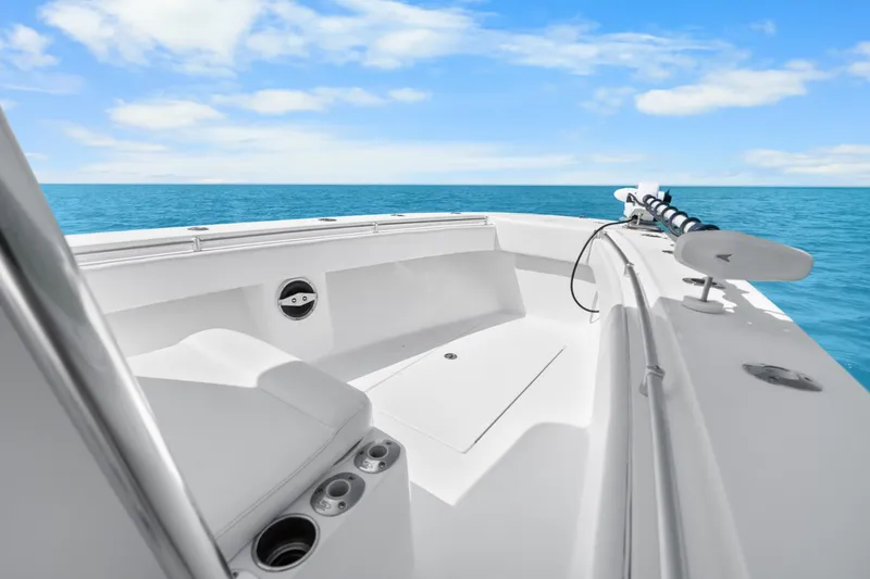 Slide: The Image of 2012 SeaHunter 29 boat on open sea under clear blue sky. - 29