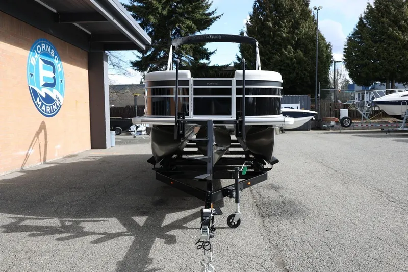 Slide: The Image of 2026 Harris Cruiser 210 SL pontoon boat on trailer at Bjornson Marine. - 12