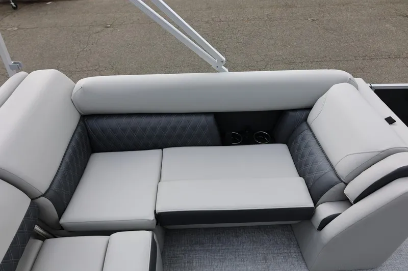 Slide: The Image of Luxurious seating on 2026 Harris Cruiser 210 SL pontoon boat, featuring elegant gray upholstery. - 21