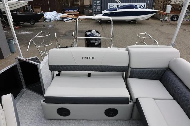 Slide: The Image of 2026 Harris Cruiser 210 SL pontoon boat interior with plush seating and modern design. - 22