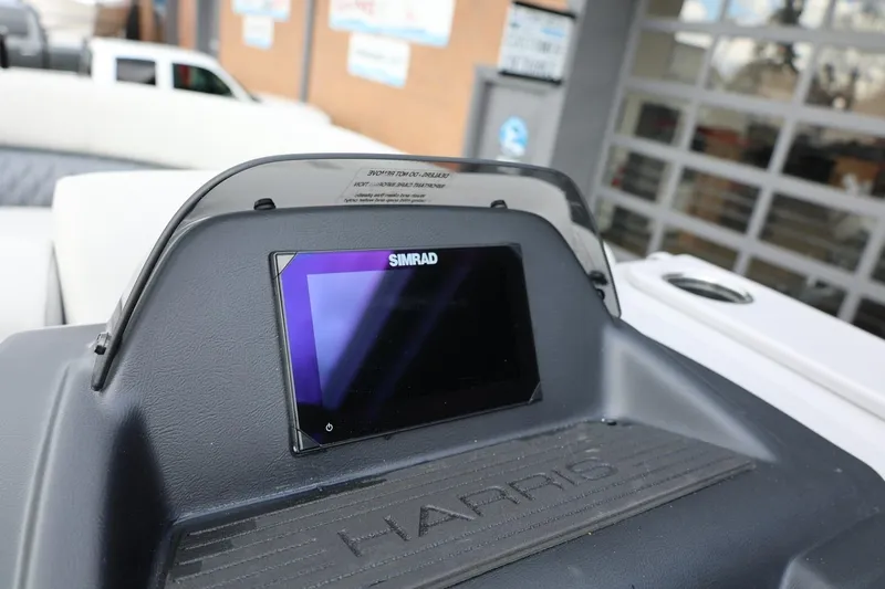 Slide: The Image of 2026 Harris Cruiser 210 SL dashboard with Simrad display. - 30