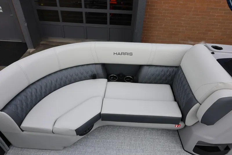 Slide: The Image of 2026 Harris Cruiser 210 SL boat interior with luxurious gray and white seating. - 41