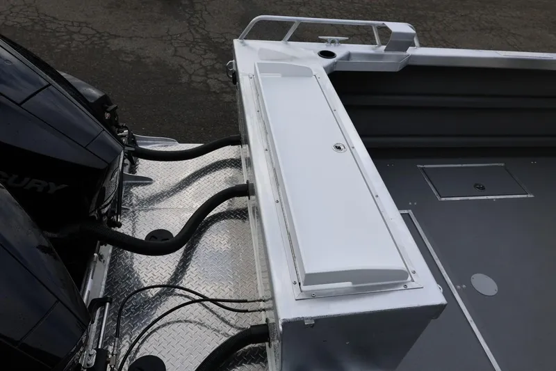 Slide: The Image of 2026 Thunder Jet 26 Alexis Pro XL boat with dual Mercury engines, rear deck view. - 16