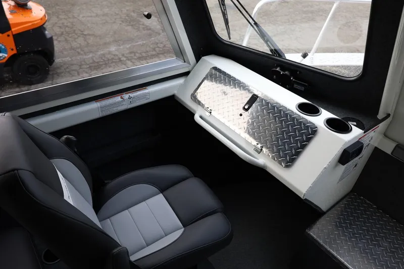 Slide: The Image of Interior of 2026 Thunder Jet 26 Alexis Pro XL boat with seating and storage. - 36