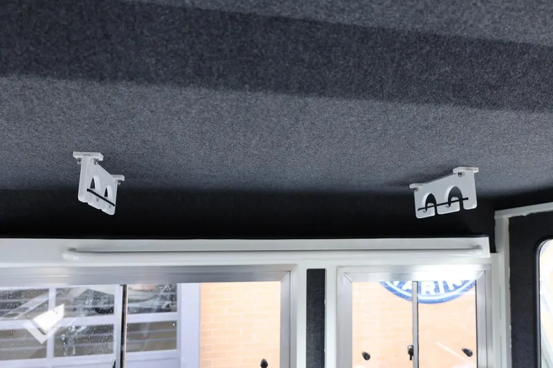 Slide: The Image of Interior ceiling of 2026 Thunder Jet 26 Alexis Pro XL boat with mounted brackets. - 53