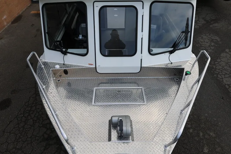 Slide: The Image of 2026 Thunder Jet 26 Alexis Pro XL boat with aluminum deck and cabin windows. - 55