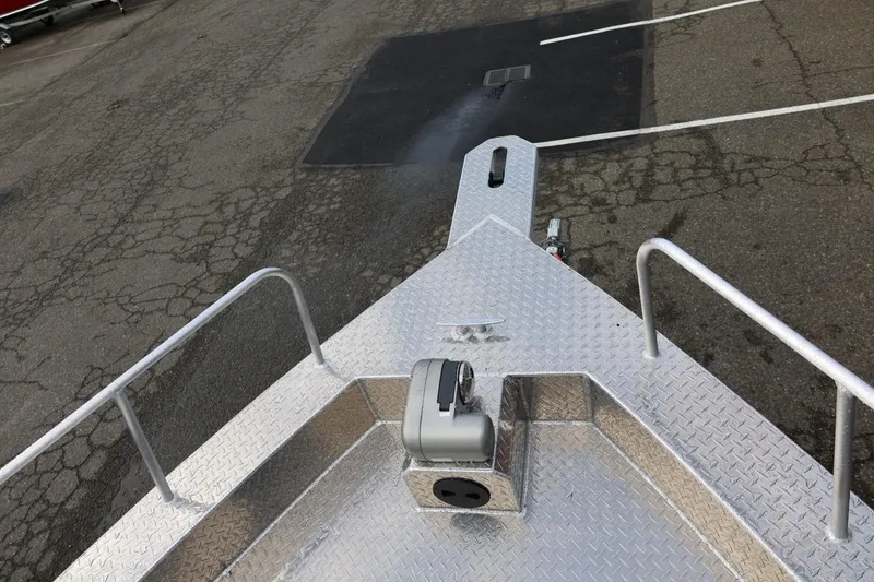 Slide: The Image of Bow of 2026 Thunder Jet 26 Alexis Pro XL boat with diamond plate deck. - 58
