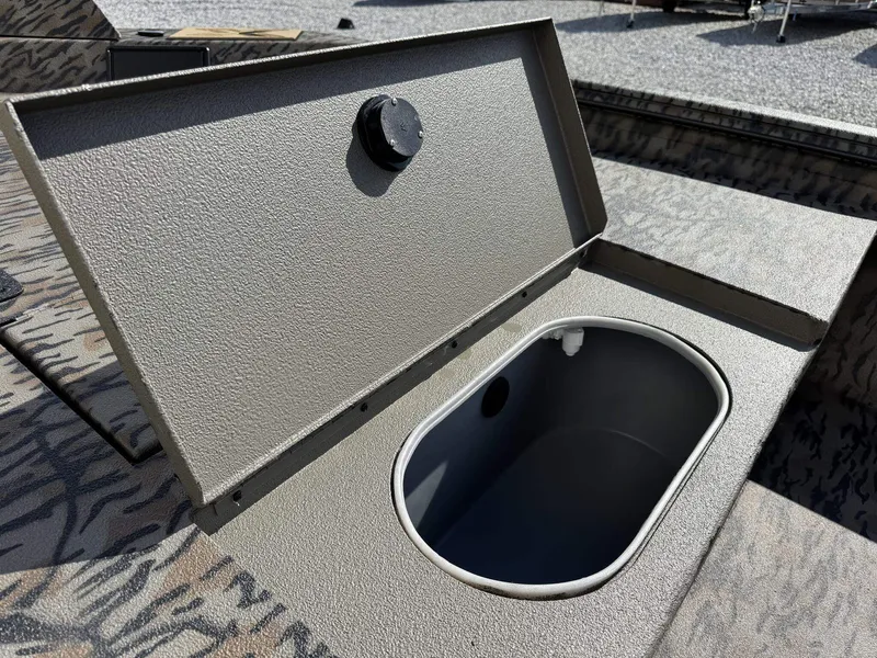 Slide: The Image of 2026 Xpress Hyper-Lift X18DB boat with open storage compartment. - 9