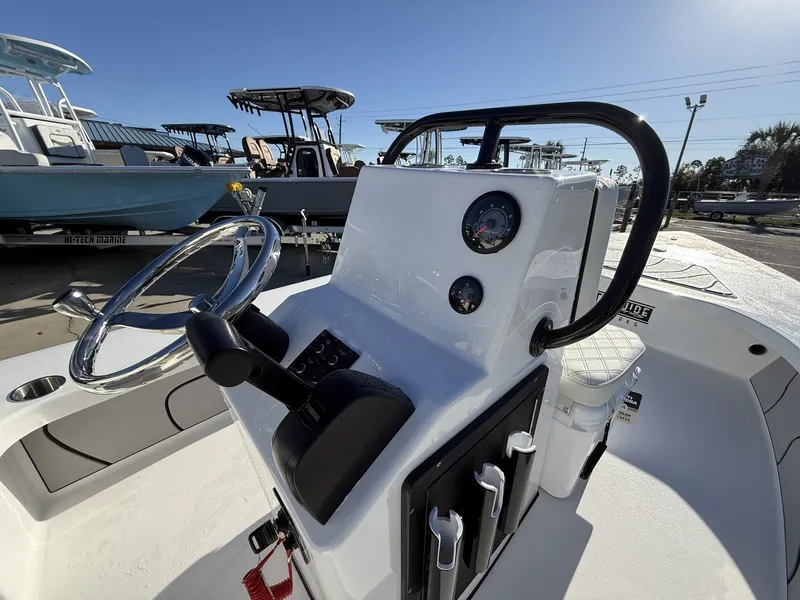 Slide: The Image of Steering console of Xplor Delta 18CC GUIDE SERIES boat, year 2026. - 14