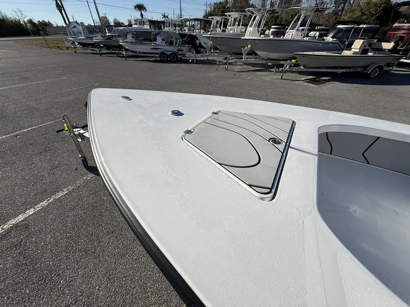 Slide: The Image of Xplor Delta 18CC GUIDE SERIES 2026 boat on parking lot. - 6