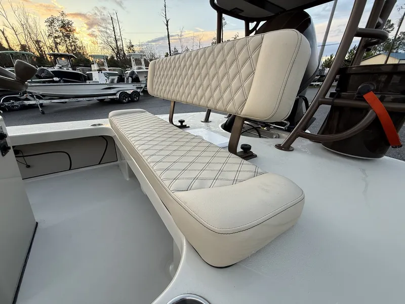 Slide: The Image of Xplor Delta 18CC GUIDE SERIES 2026 boat seat at sunset. - 5