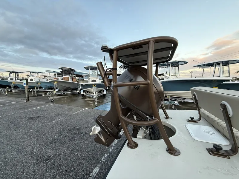 Slide: The Image of Xplor Delta 18CC GUIDE SERIES 2026 boats in a parking lot. - 8