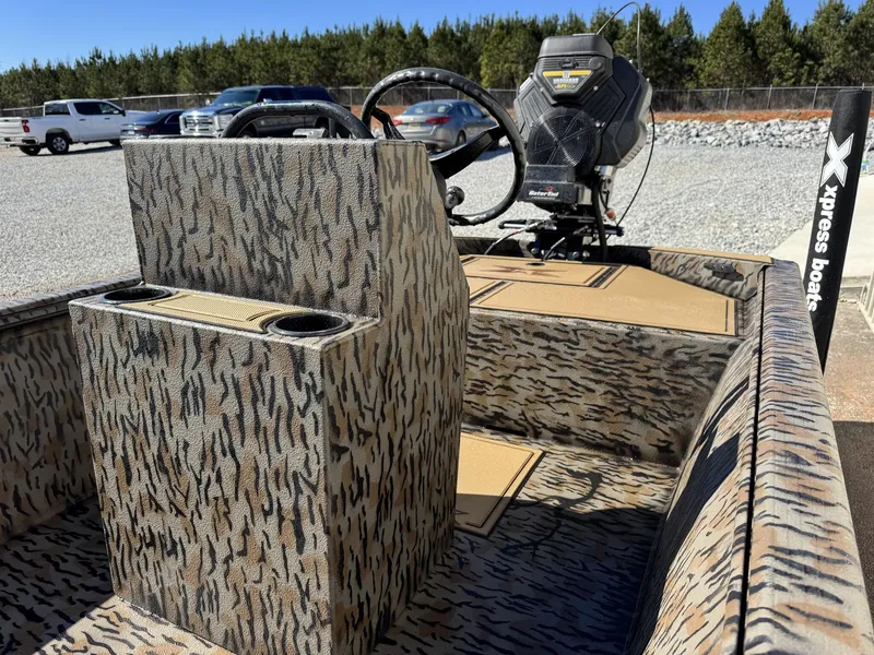 Slide: The Image of 2026 Xpress Bayou Series 180CC boat with camouflage pattern. - 8