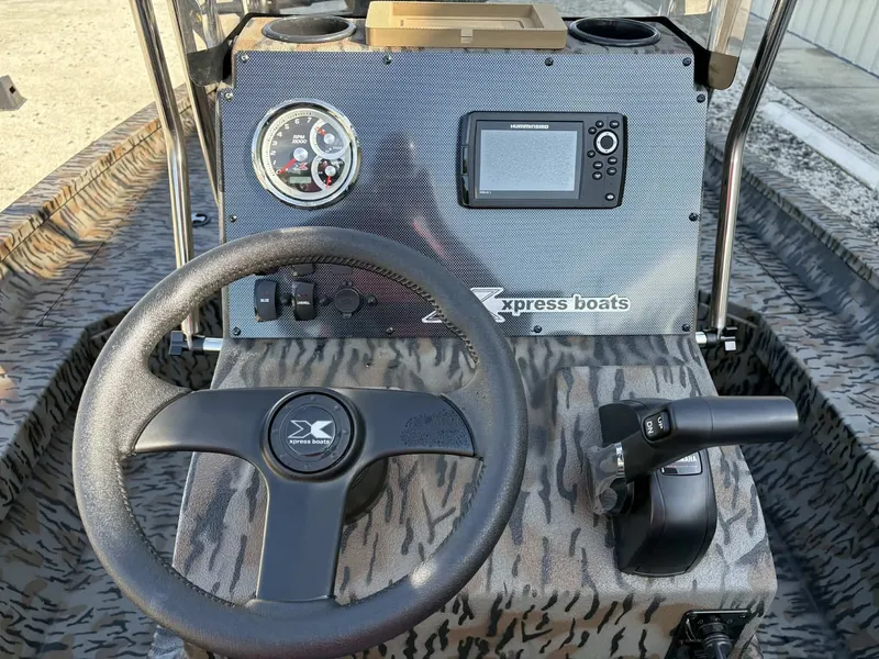 Slide: The Image of Dashboard of 2026 Xpress H20B Bay boat. - 11