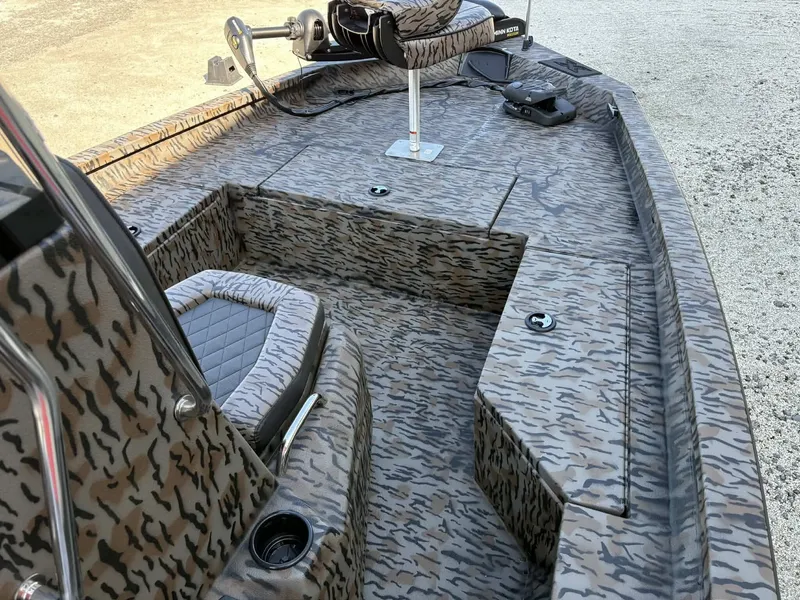 Slide: The Image of Interior of 2026 Xpress H20B Bay boat with camouflage pattern. - 12