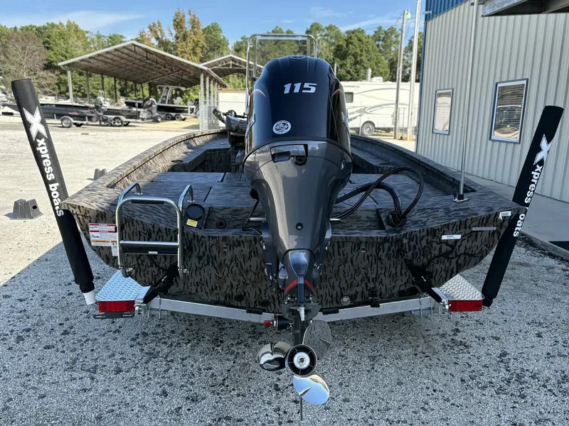 Slide: The Image of Rear view of 2026 Xpress H20B Bay boat with outboard motor. - 7