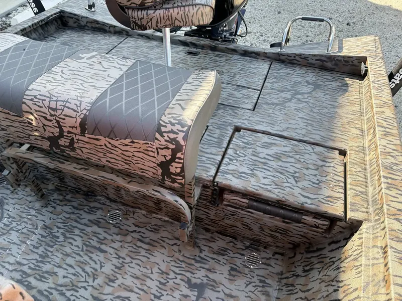 Slide: The Image of 2026 Xpress H20B Bay boat with camouflage pattern design. - 8