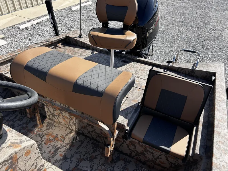 Slide: The Image of Interior of a 2026 Xpress H20B Bay boat with cushioned seats. - 10