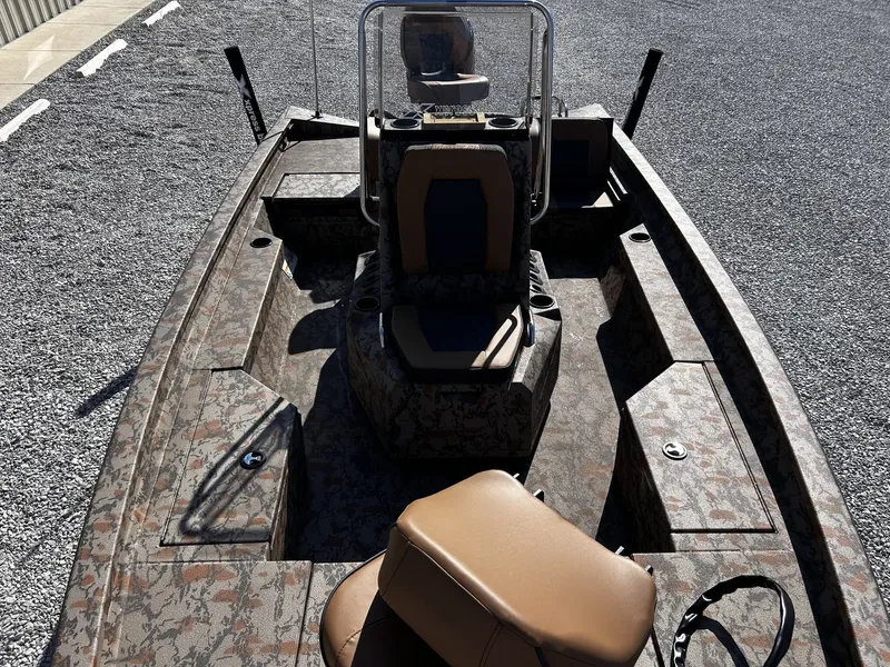 Slide: The Image of 2026 Xpress H20B Bay boat with camouflage design. - 12