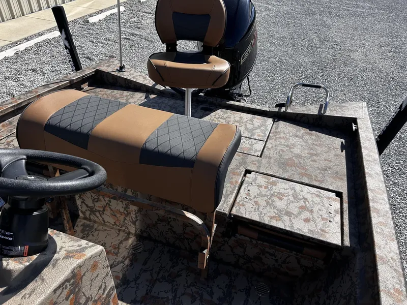 Slide: The Image of 2026 Xpress H20B Bay boat with cushioned seats. - 5