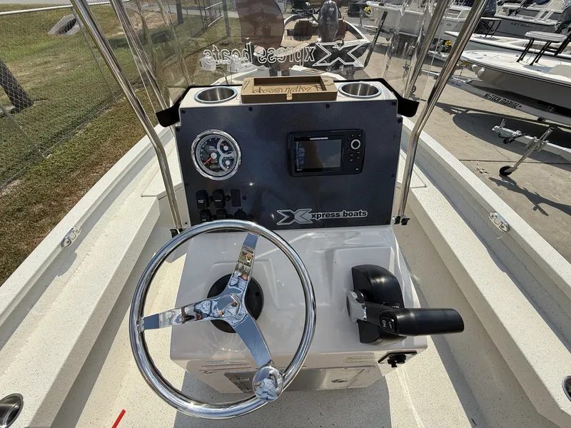 Slide: The Image of Steering console of Xpress H20B Bay boat, year 2026. - 11