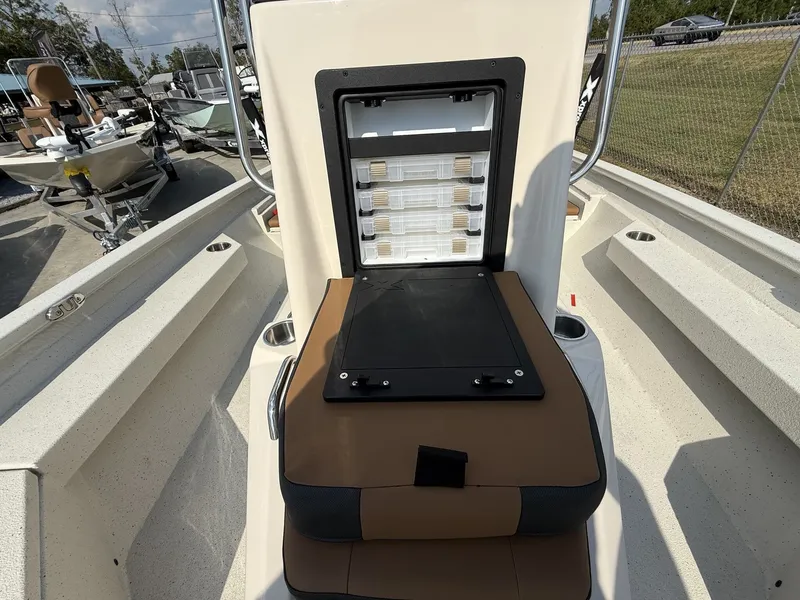 Slide: The Image of 2026 Xpress H20B Bay boat with storage and seating area. - 9