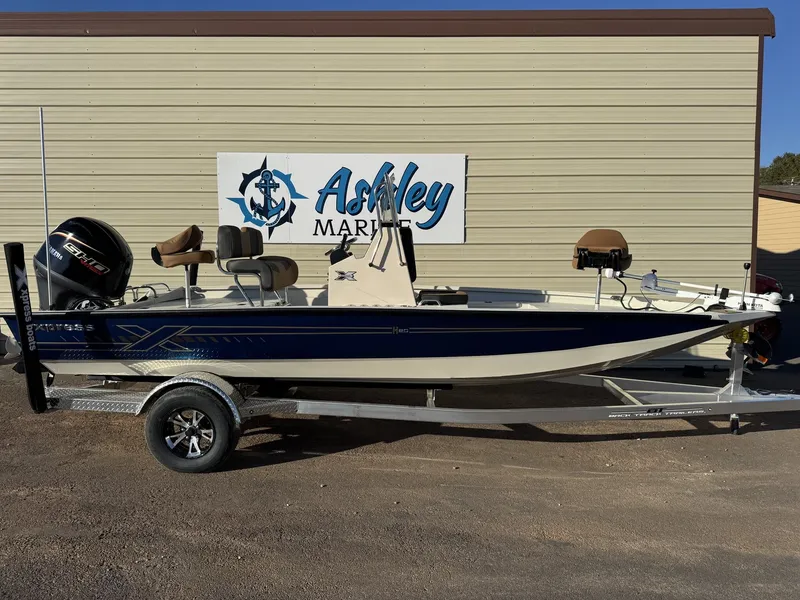 Slide: The Image of 2026 Xpress H20B Bay boat on trailer at Ashley Marine. - 2
